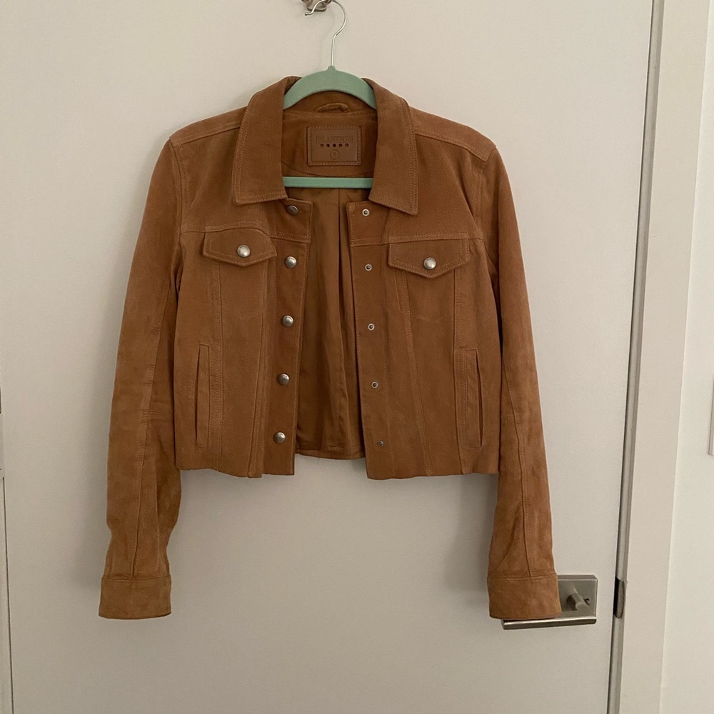 Tan suede jacket.